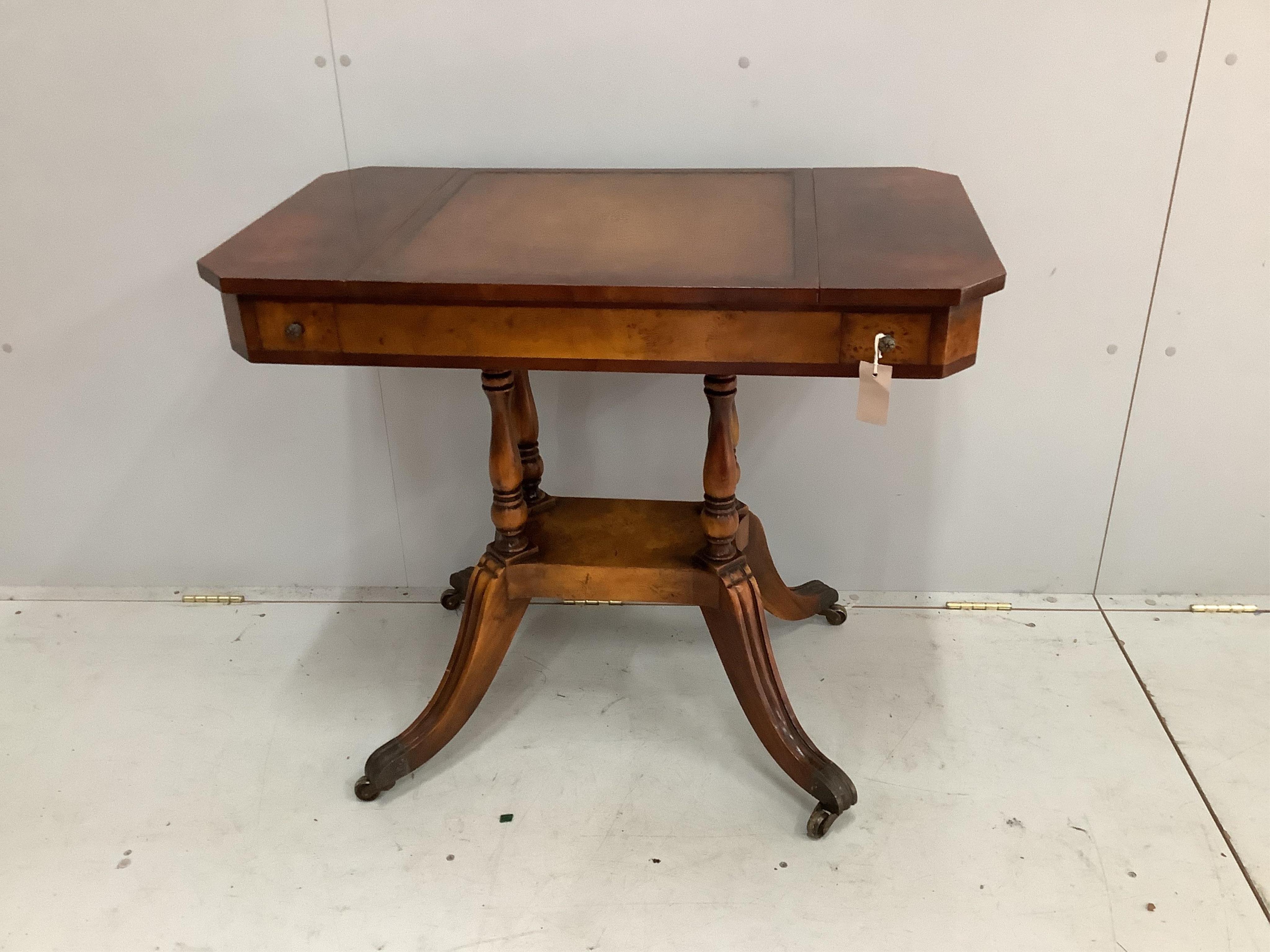 A reproduction bird's eye maple games table, with chess and backgammon surfaces, width 89cm, depth 50cm, height 76cm. Condition - fair